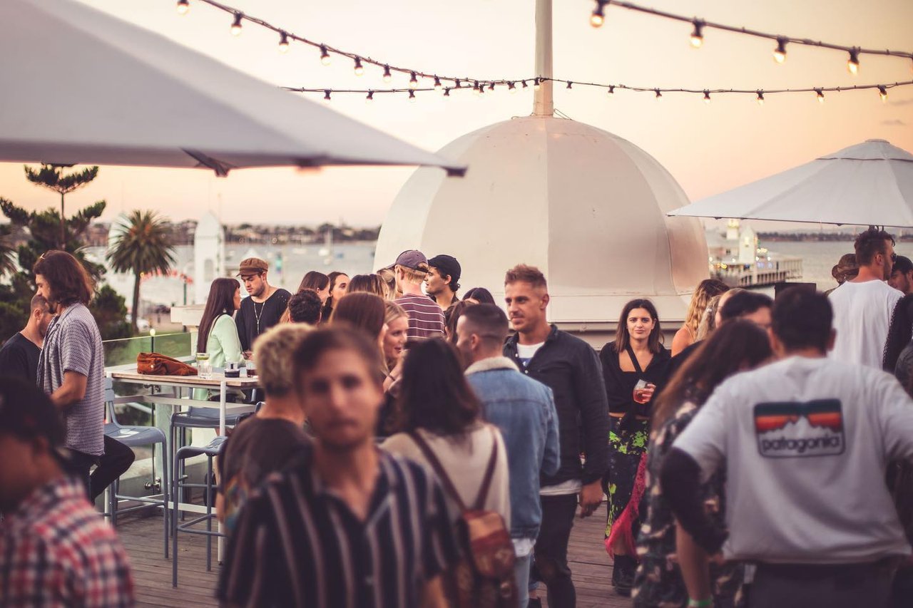 People chat and drink at Sailors' Rest rooftop bar