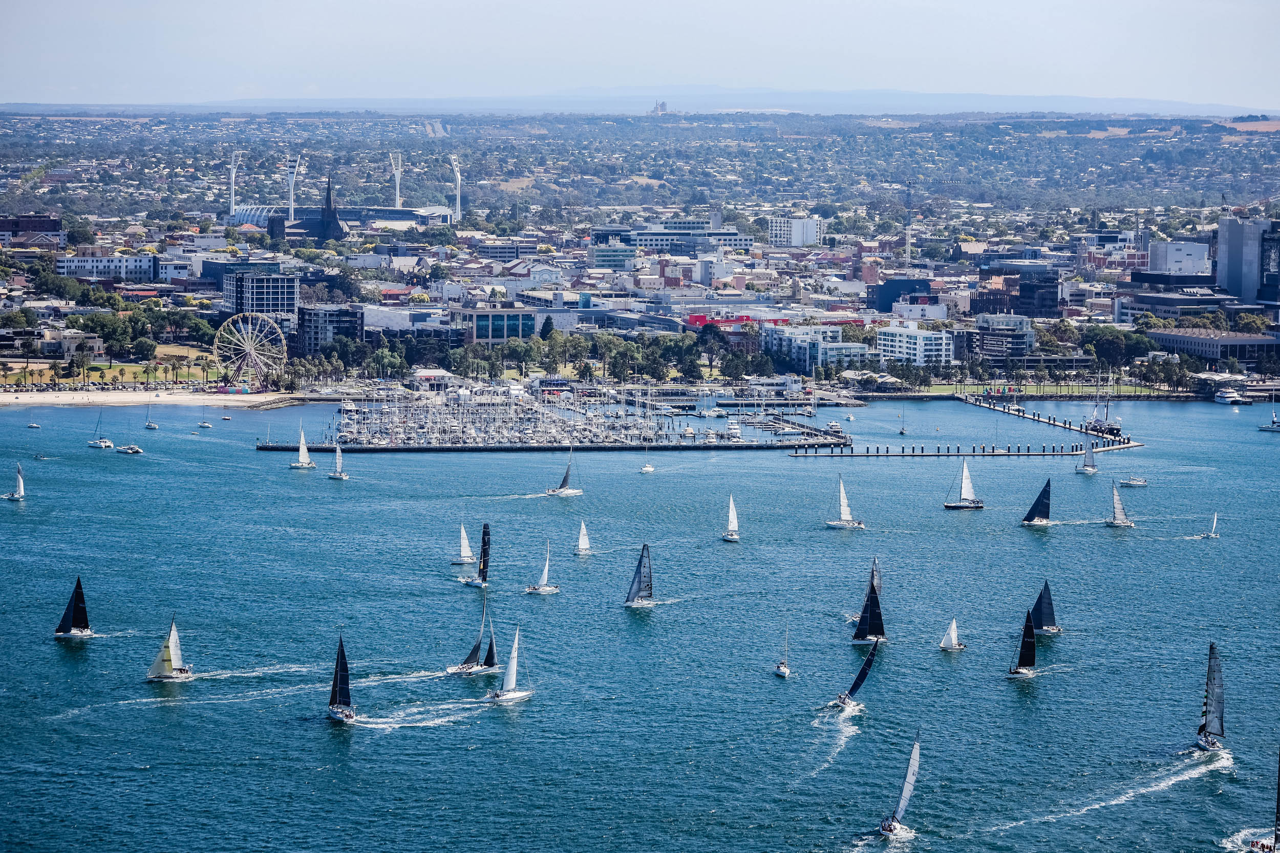 Boats sailing in Corio Bay in front of the Geelong Waterfront