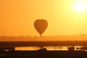 Image of hot air balloon during sunrise