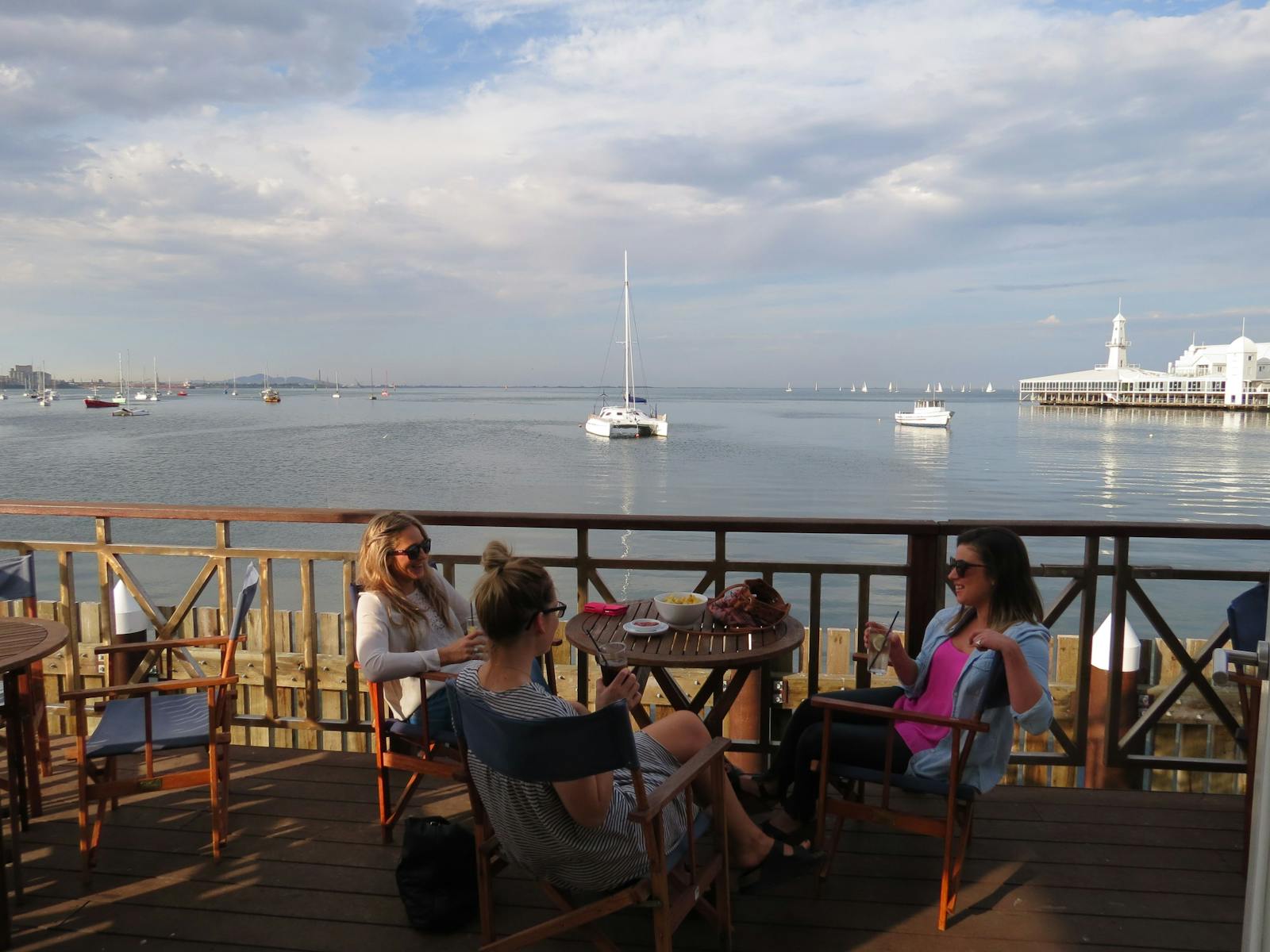 Al fresco dining above Geelong Boathouse, overlooking Corio Bay and Cunningham Pier.