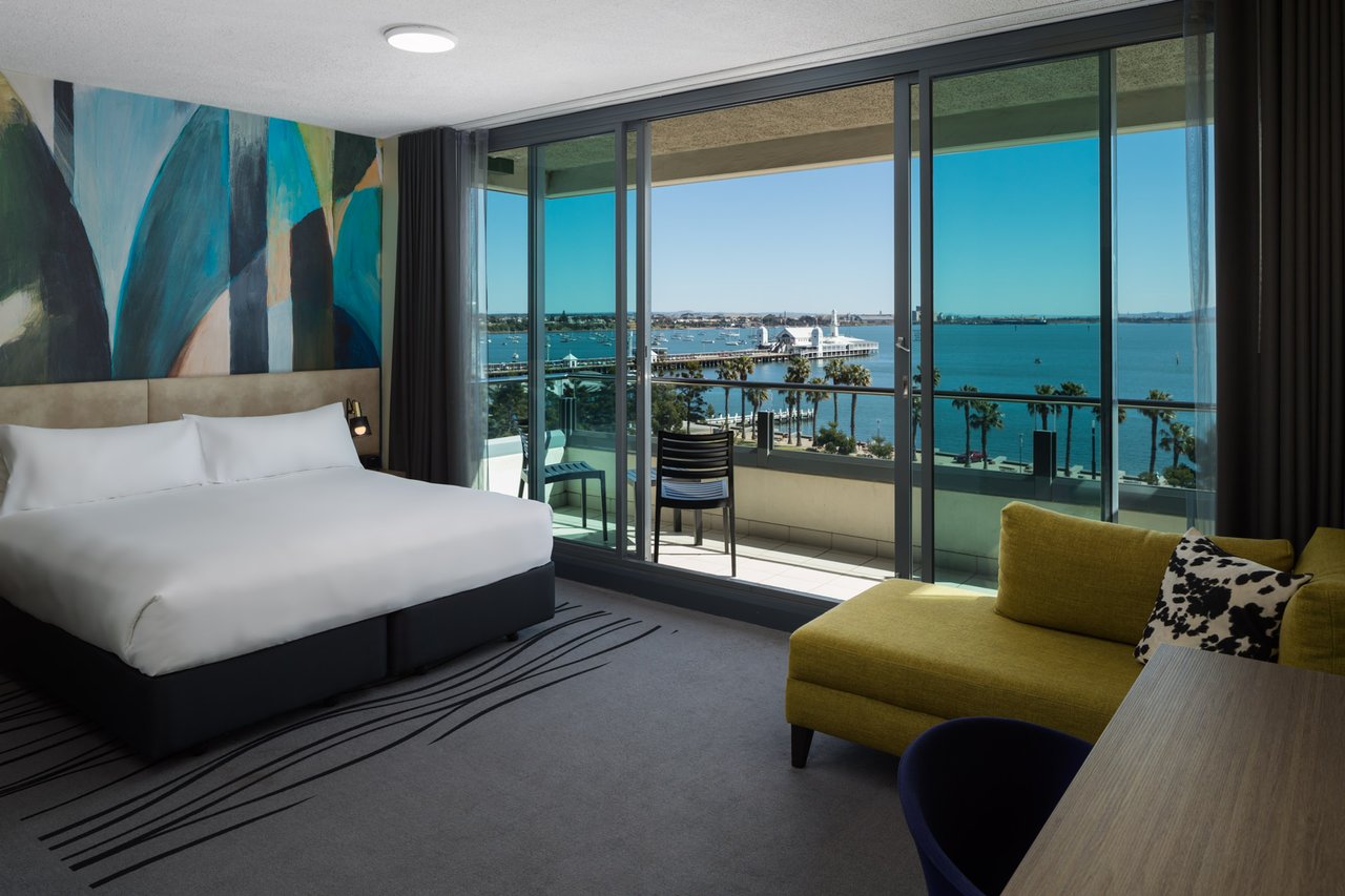 The deluxe king room with views of the bay at Novotel Geelong.
